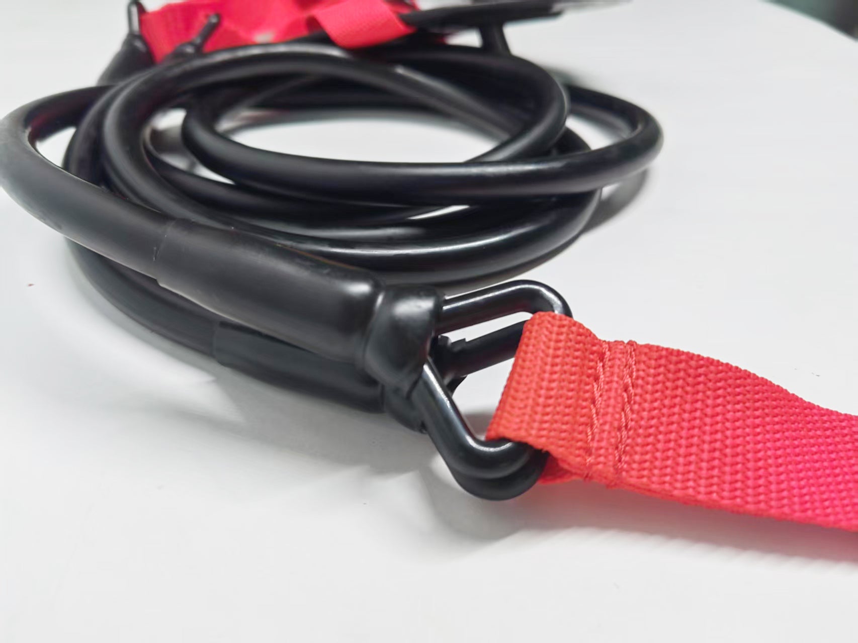 Swimming fitness cord with paddles